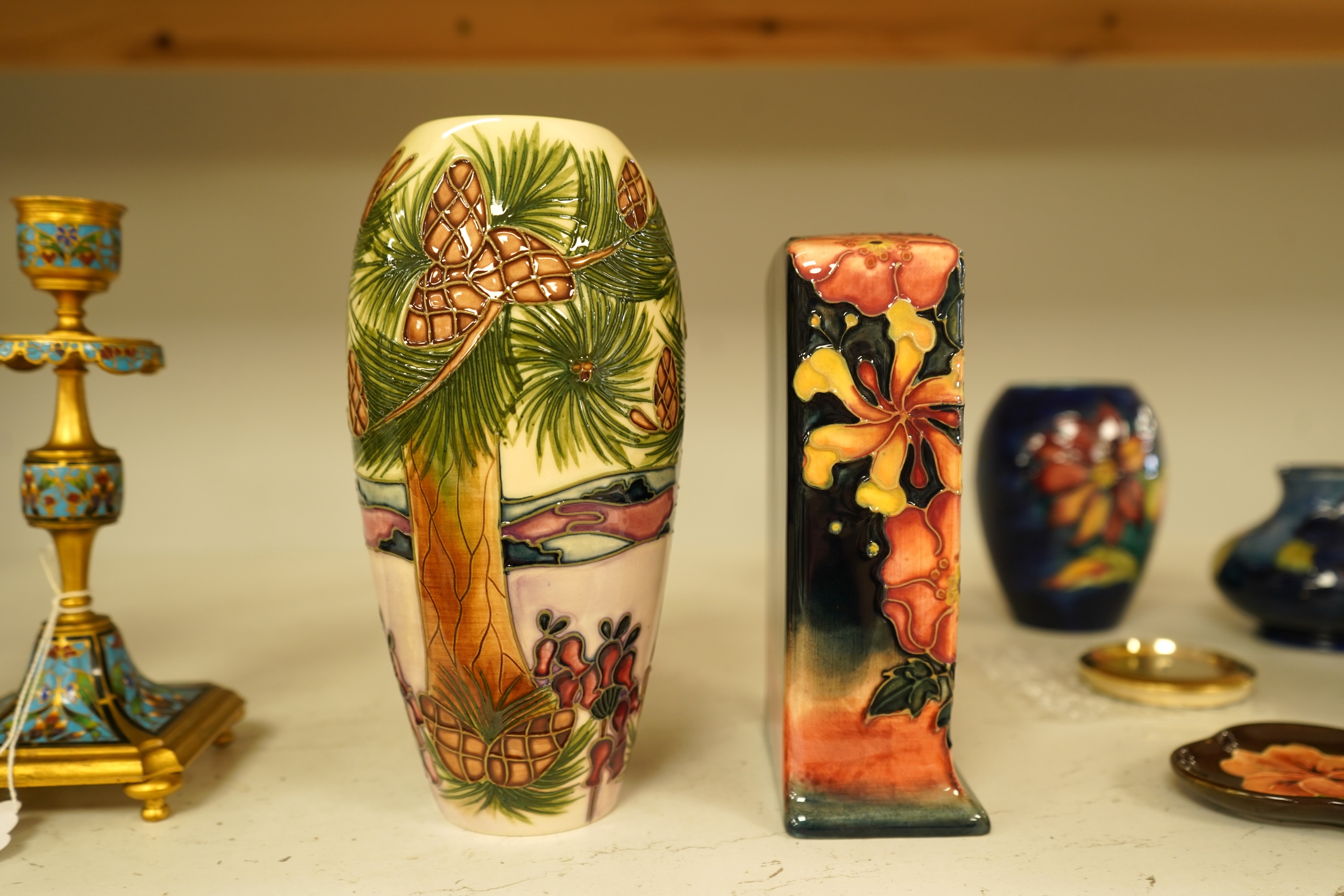 A collection of nine modern Moorcroft pieces including a Furzy Hill vase and a Toadstool vase, tallest 19cm